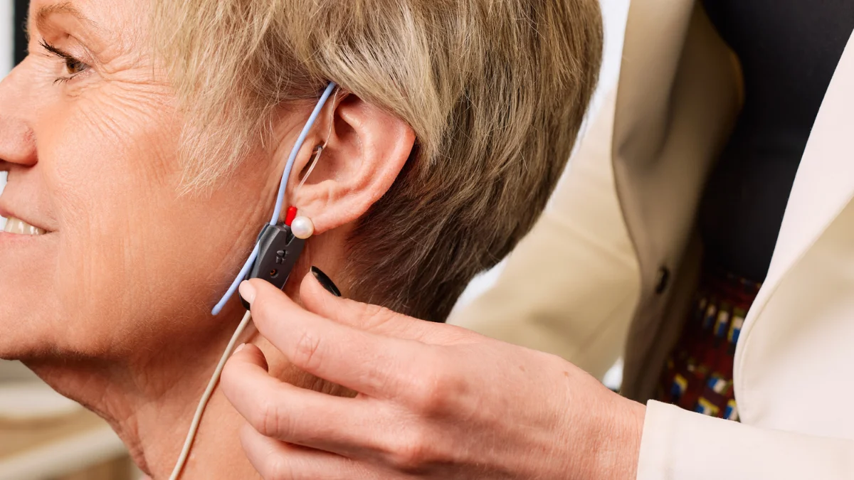 Drew performing Real Ear Measurement. 