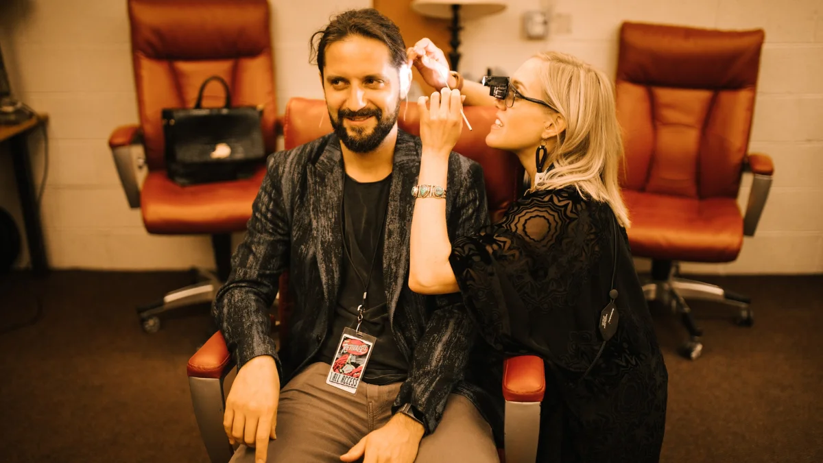 Drew molding a musicians ear.